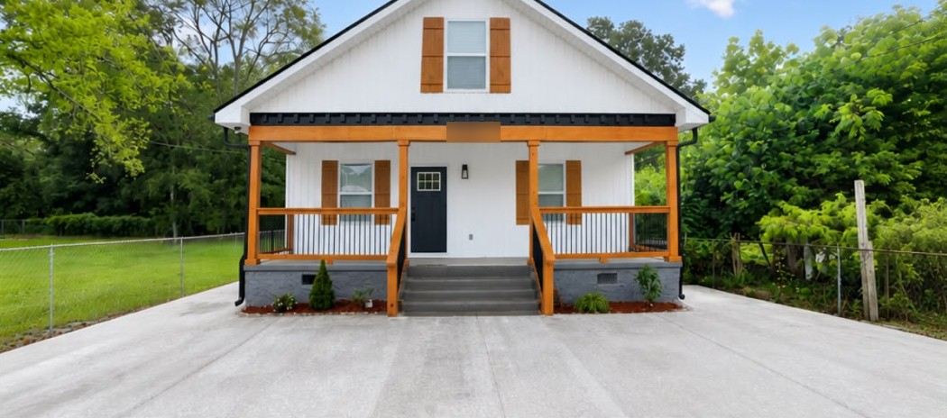 After: East Chattanooga — new siding, porch, roof and driveway.