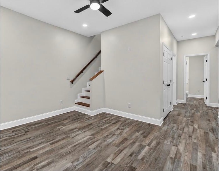 After: Gutted to the studs — new floor framing, walls, stairs and lighting.